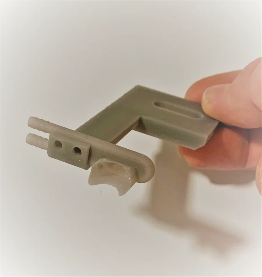 Image shows a photo of a 3D printed mouse anesthesia mask